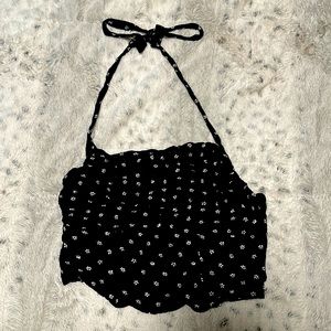 A cropped shirt. No straps only strings